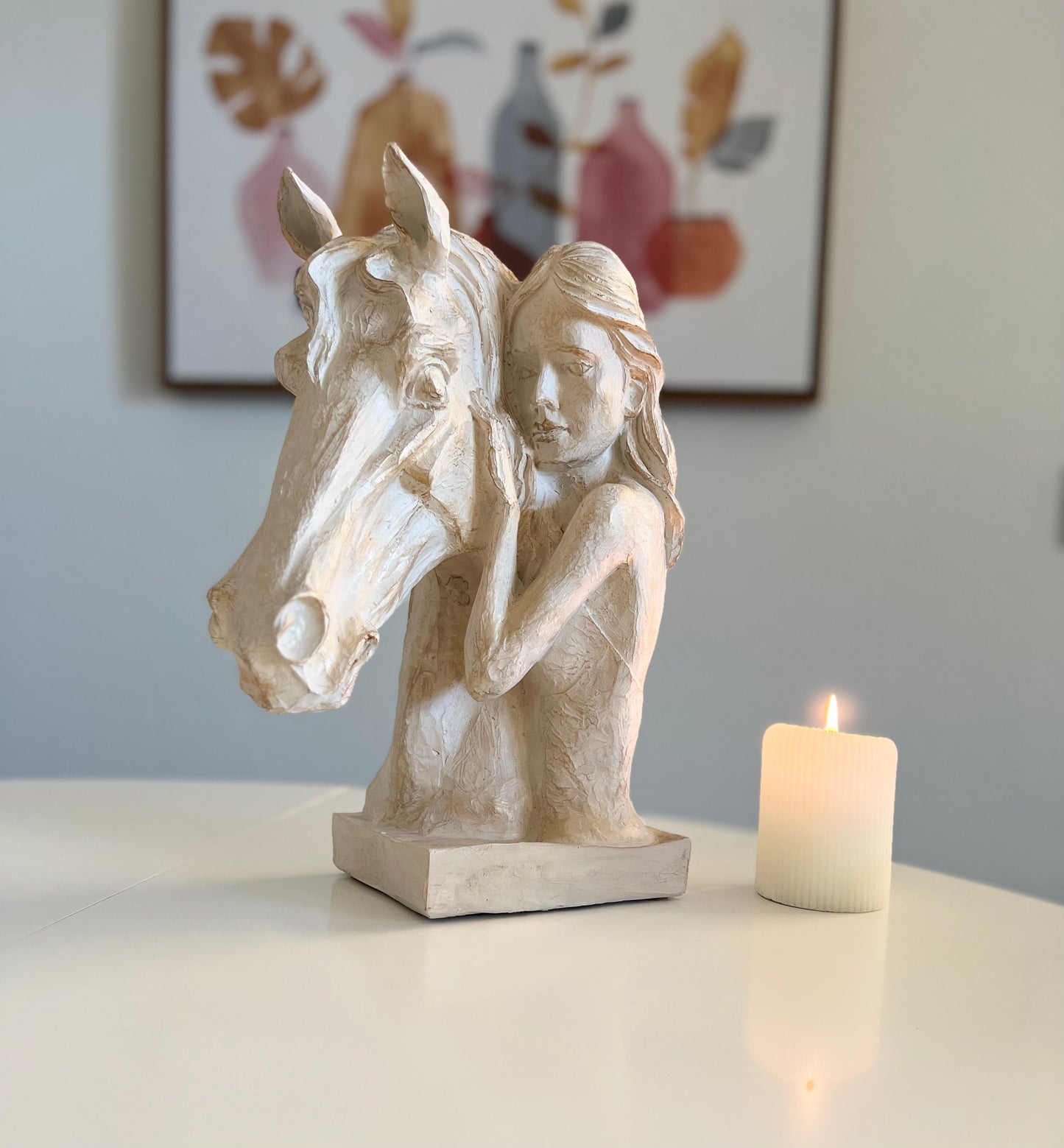 Decorative horse and woman statue symbolizing equestrian spirit, available in beige and beige gold colors.