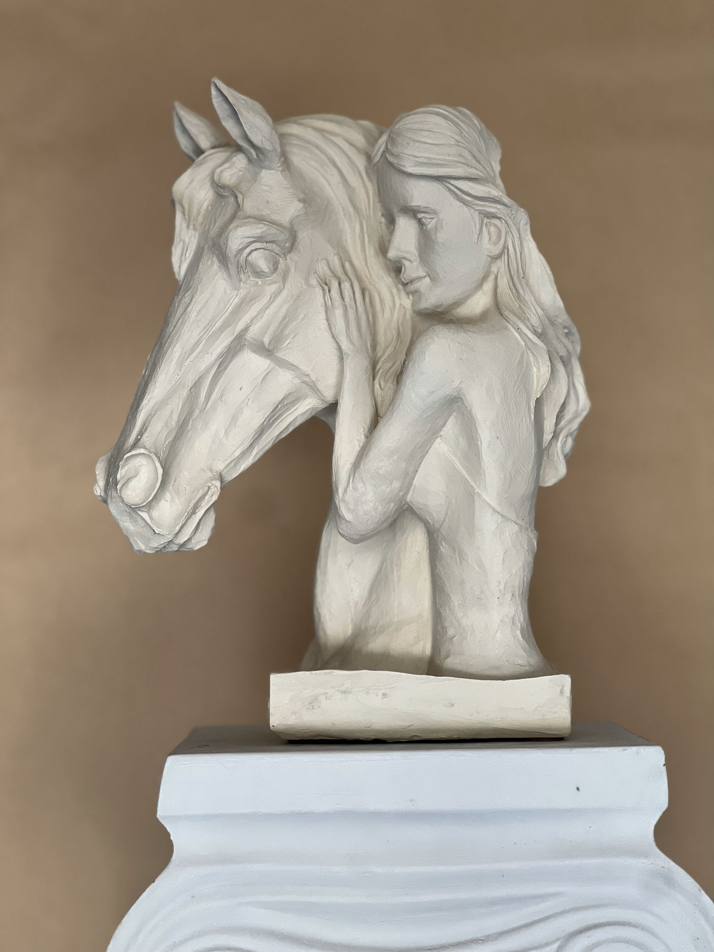 Decorative horse and woman statue symbolizing equestrian spirit, available in Black/Gold or Black/Silver colors.