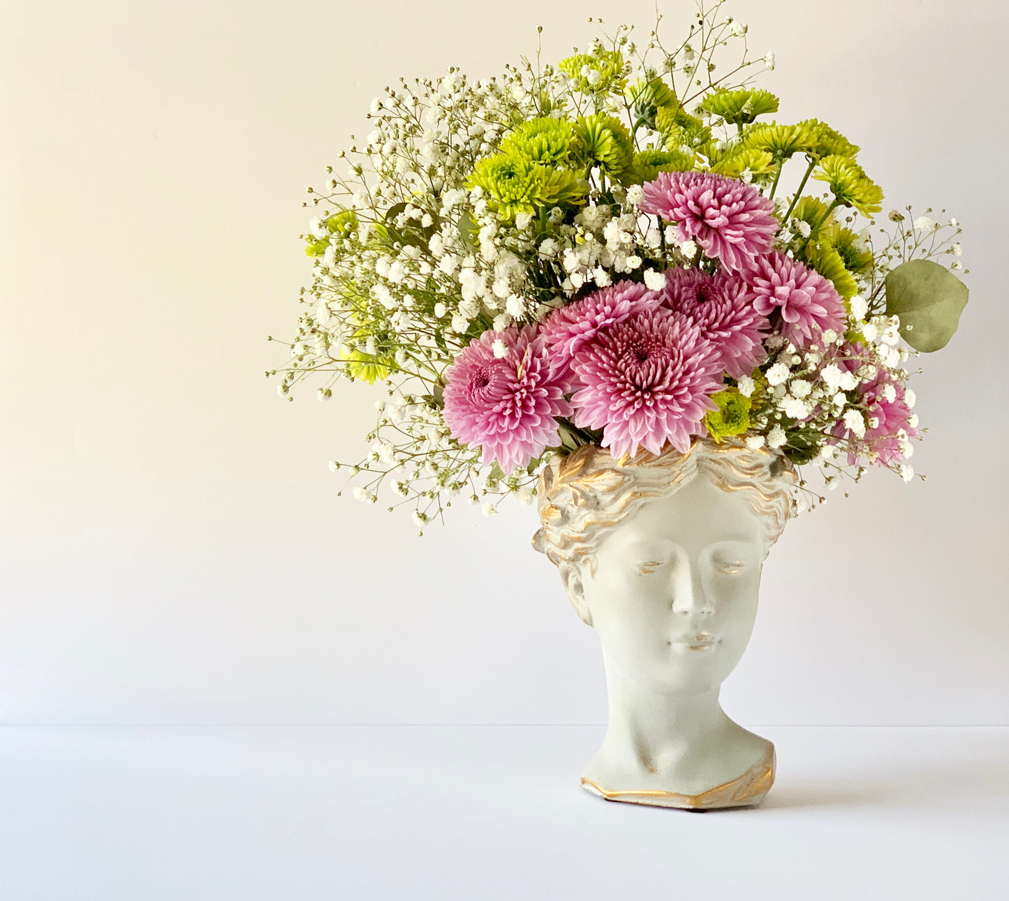 Handmade Greco-Roman Goddess Venus Head statue planter with antique finish, ideal for displaying succulents, herbs, or candles.