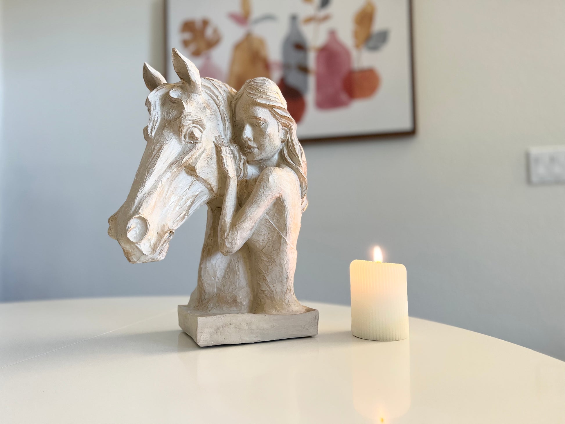 Decorative horse and woman statue symbolizing equestrian spirit, available in beige and beige gold colors.
