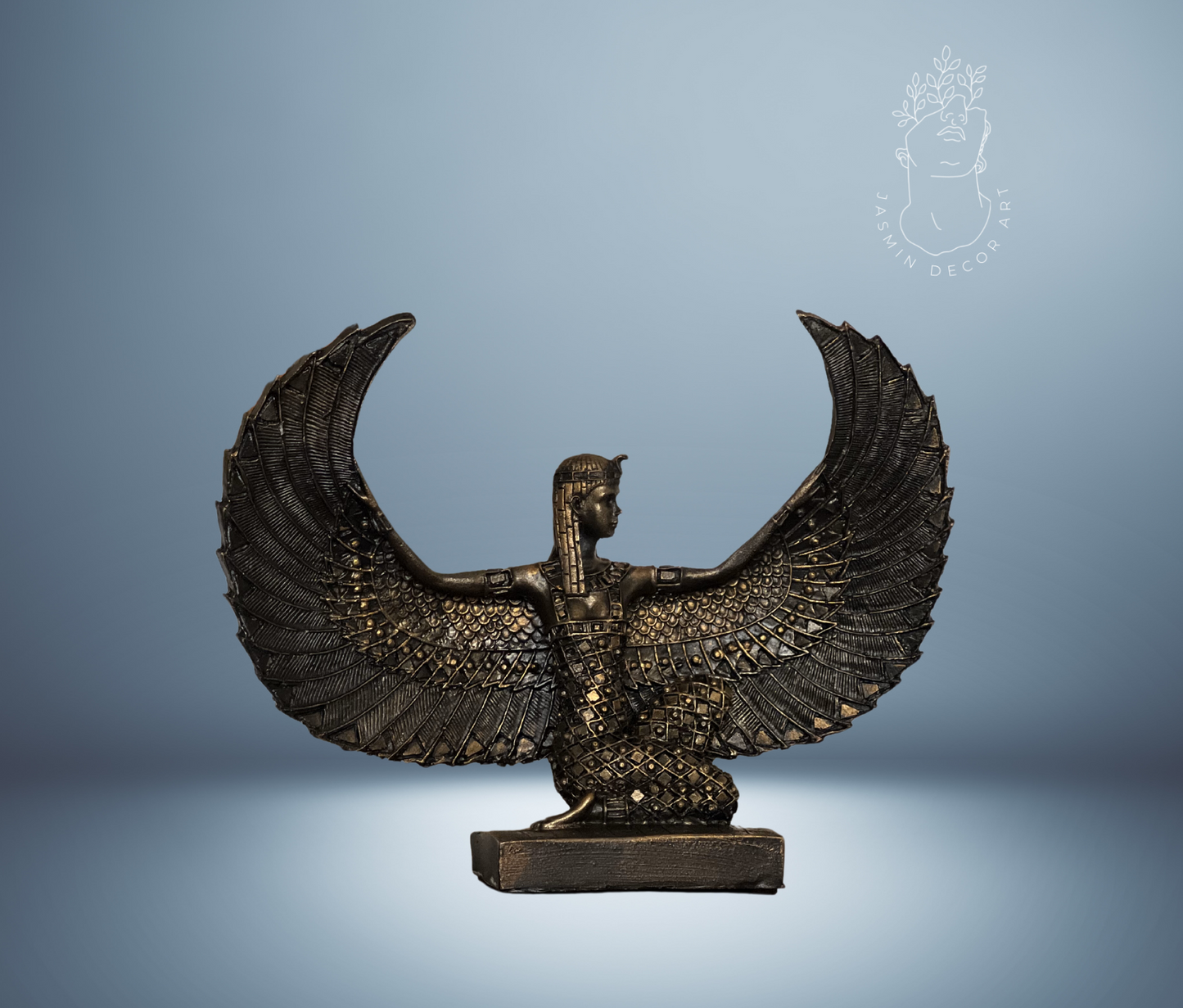 Artistically crafted Egyptian Goddess Isis statue with open wings, adorned in gold leaf, symbolizing ancient Egyptian mystique and maternal power